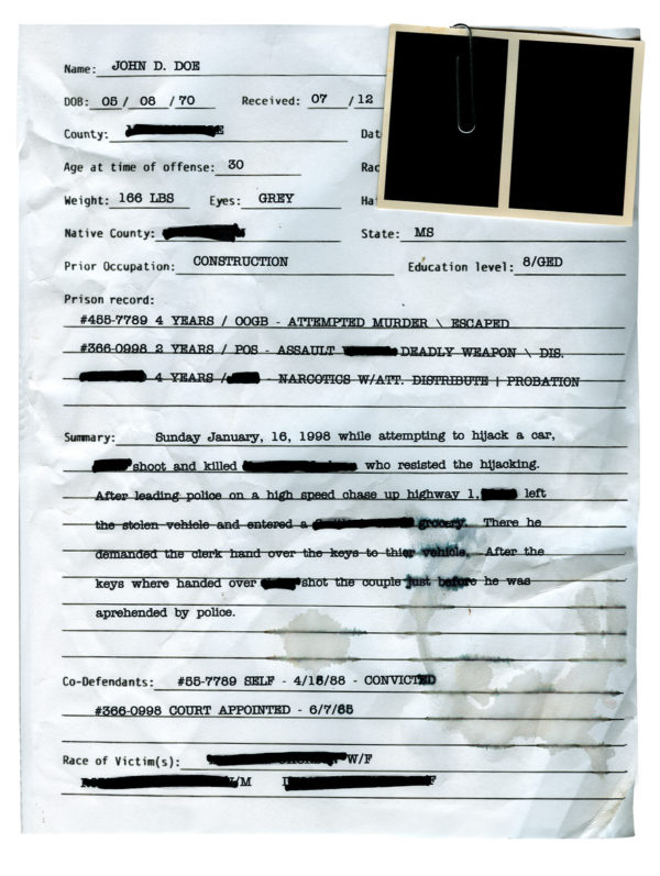 Police record with a blank mugshot and redacted info
