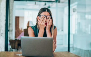 Woman Being Stressed At Work
