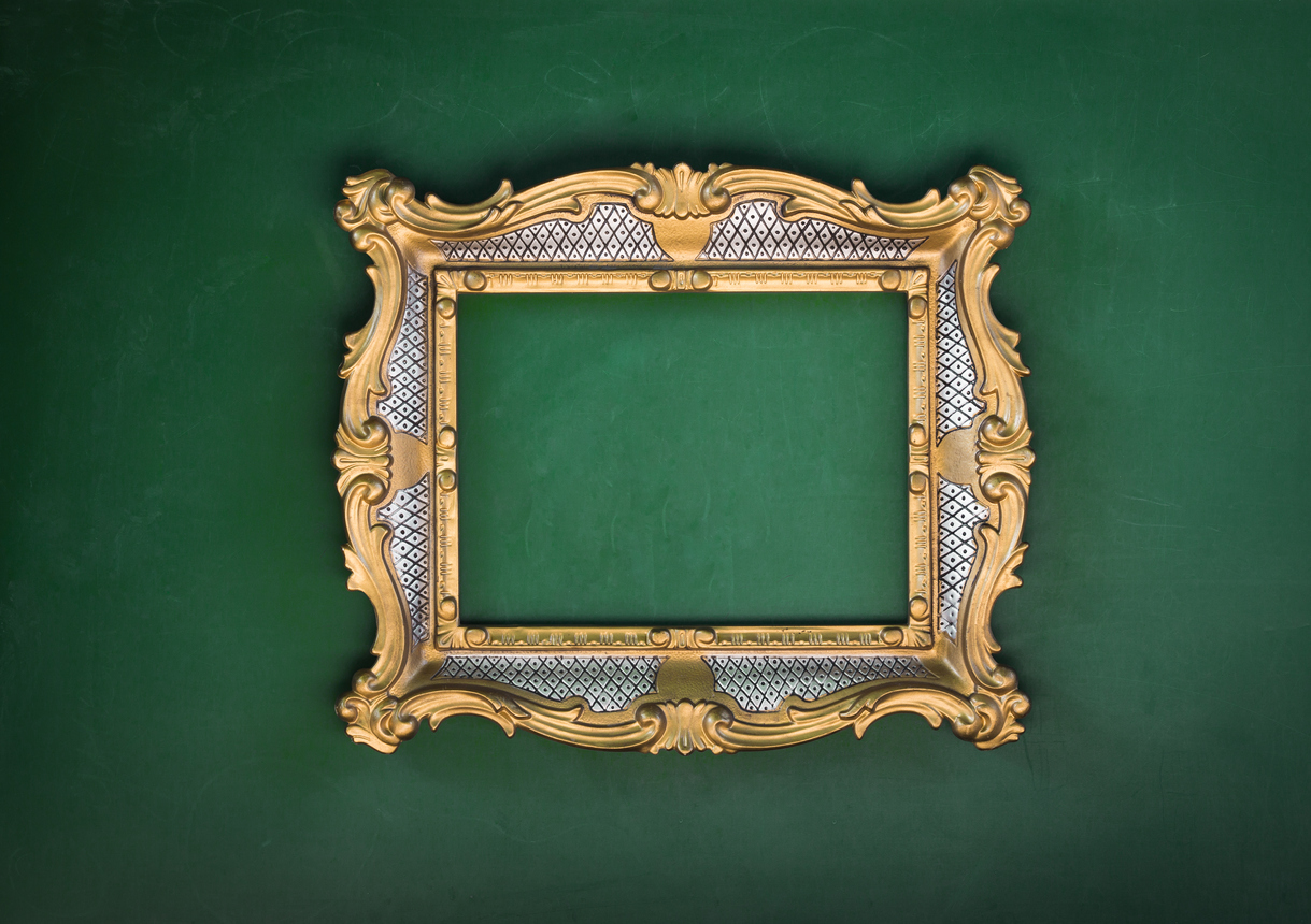 Picture frame on green wall