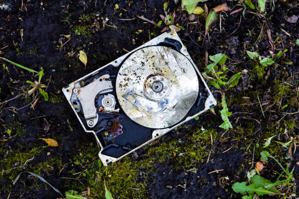 Crushed hard disk in the dirt