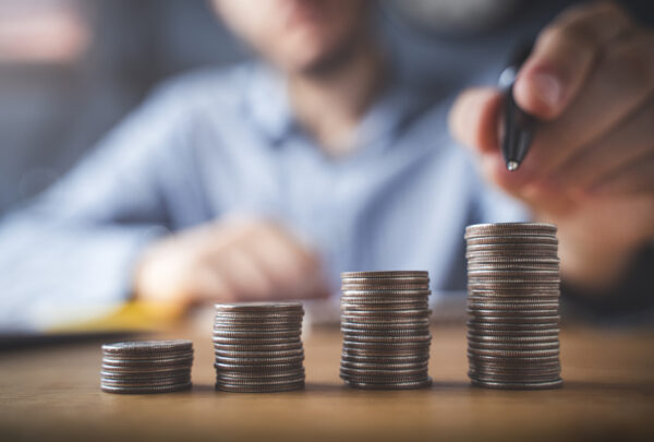 Man stacking coins