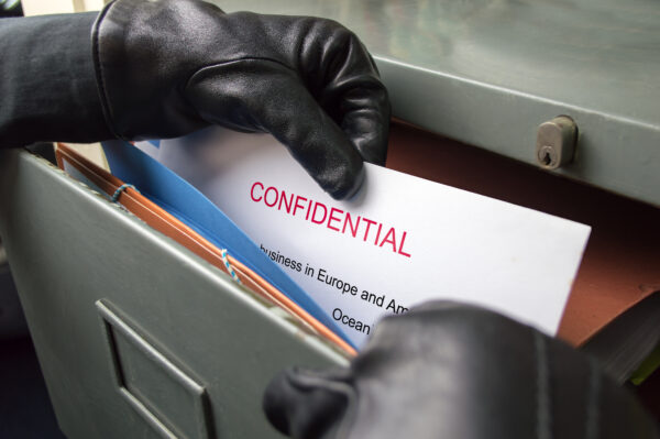 Thief stealing confidential documents