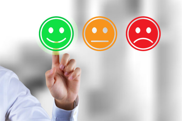 3 cartoon faces signifying customer feedback