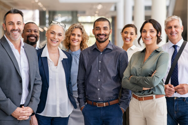 Group of businesspeople smiling for the camera