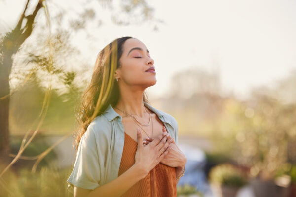 Young woman breathing a sigh of relief