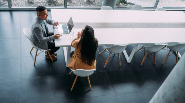 businesspeople in a meeting at a table