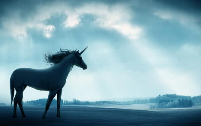 Shot of a beautiful unicorn against against a dramatic landscape