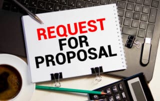 Request for proposal text on brown envelope.