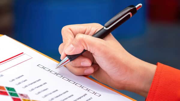 Person checking an inventory list